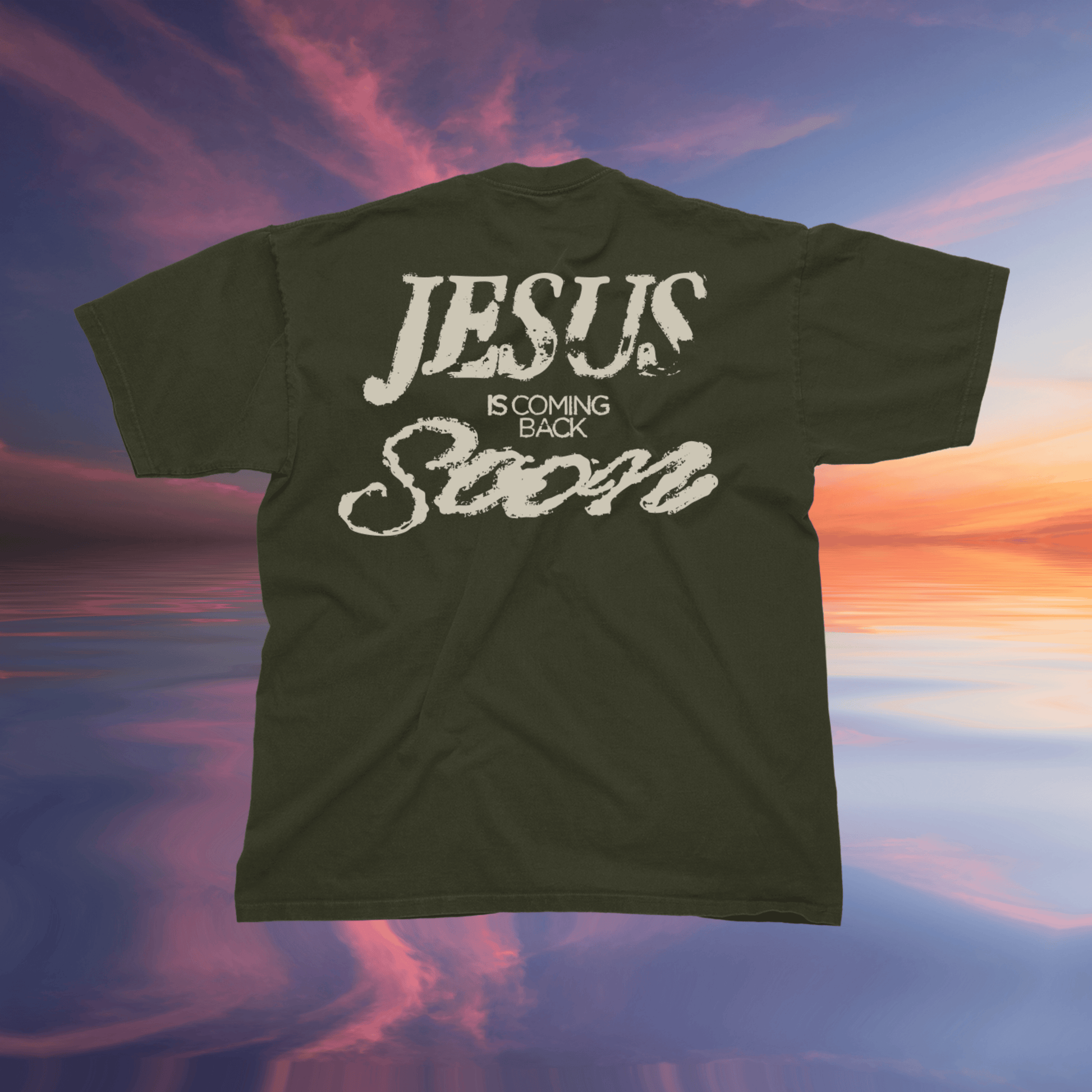 Green t-shirt with 'Jesus is Coming Back Soon' text against a colorful sky background