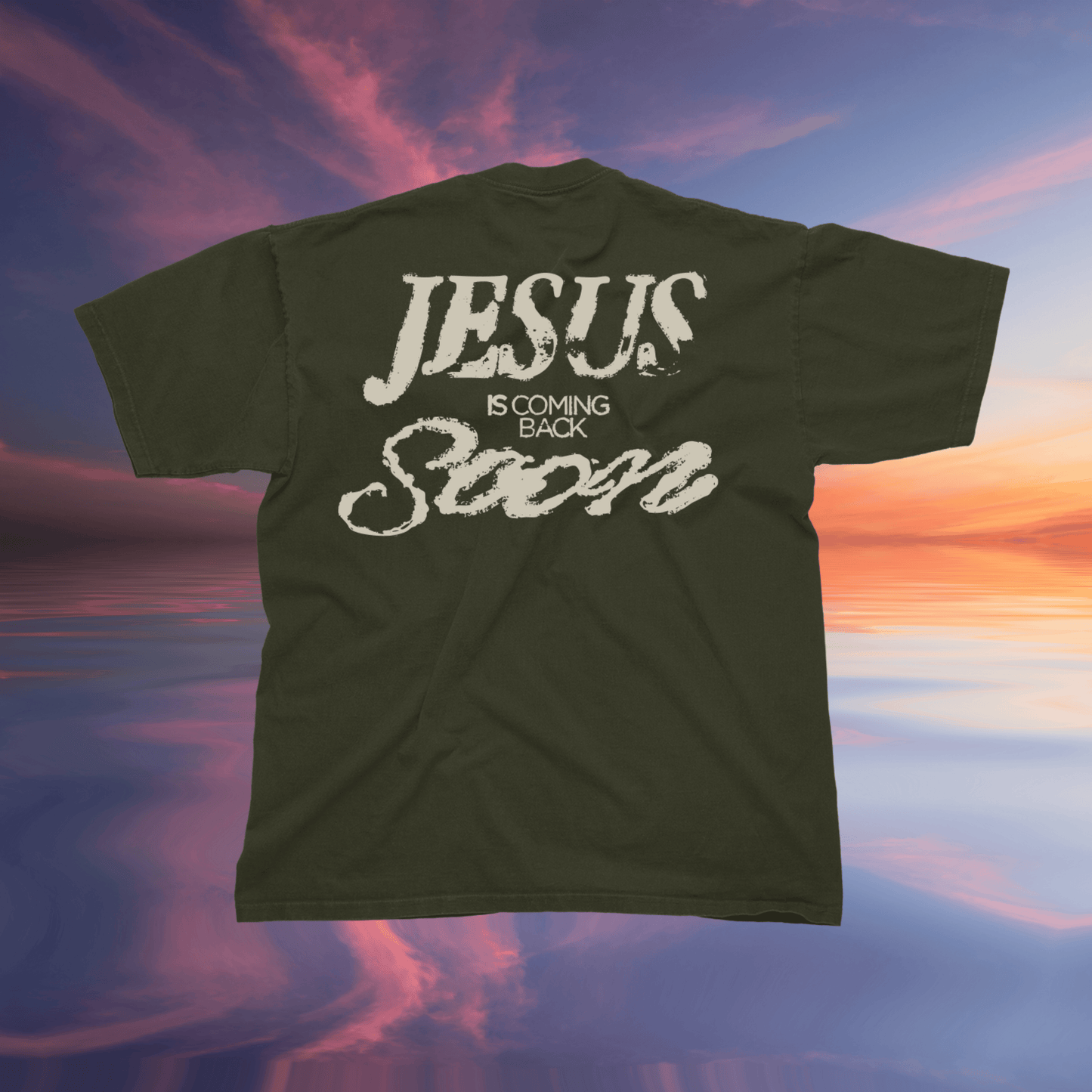 Green t-shirt with 'Jesus is Coming Back Soon' text against a colorful sky background