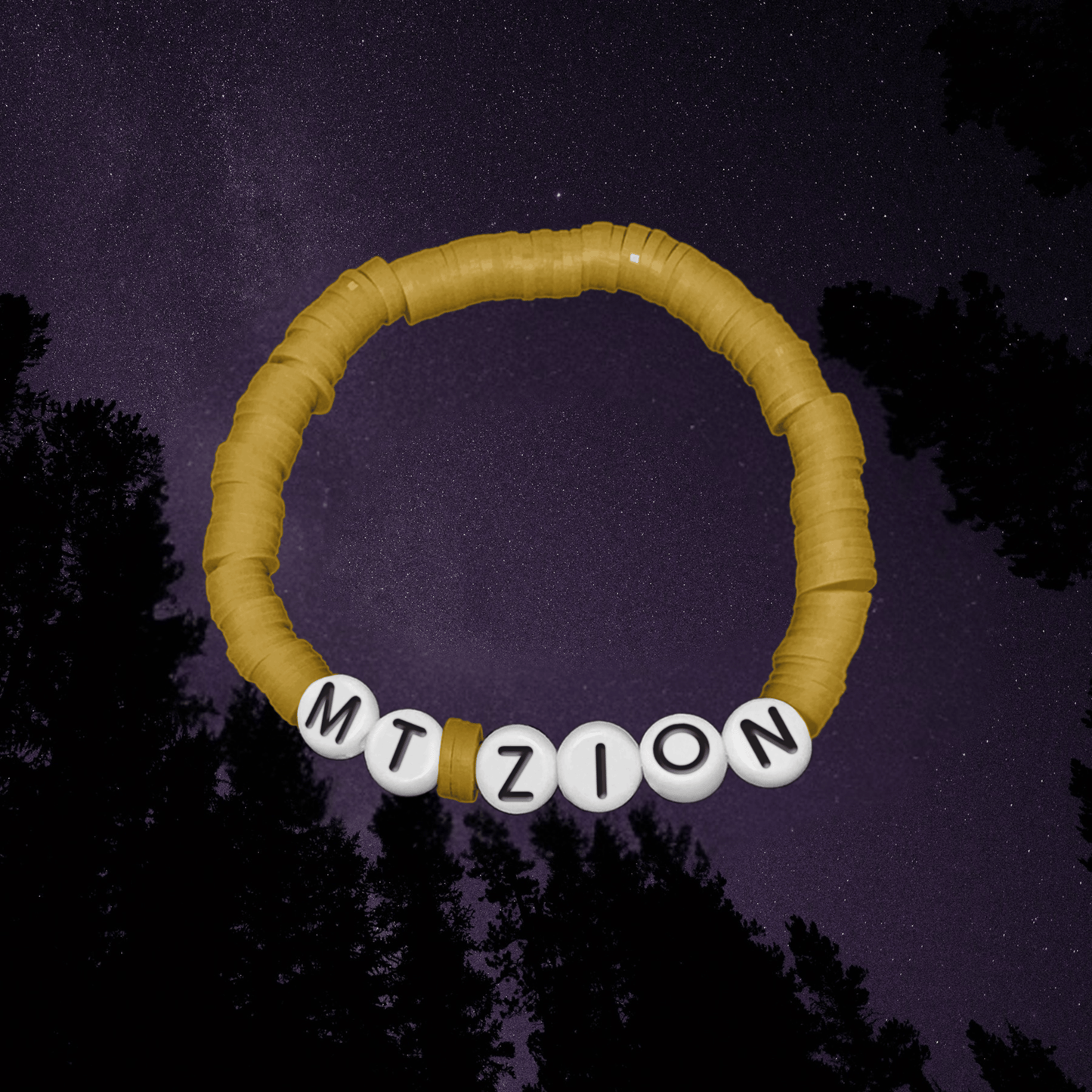 Yellow bracelet with 'MTZION' beads against a dark sky background
